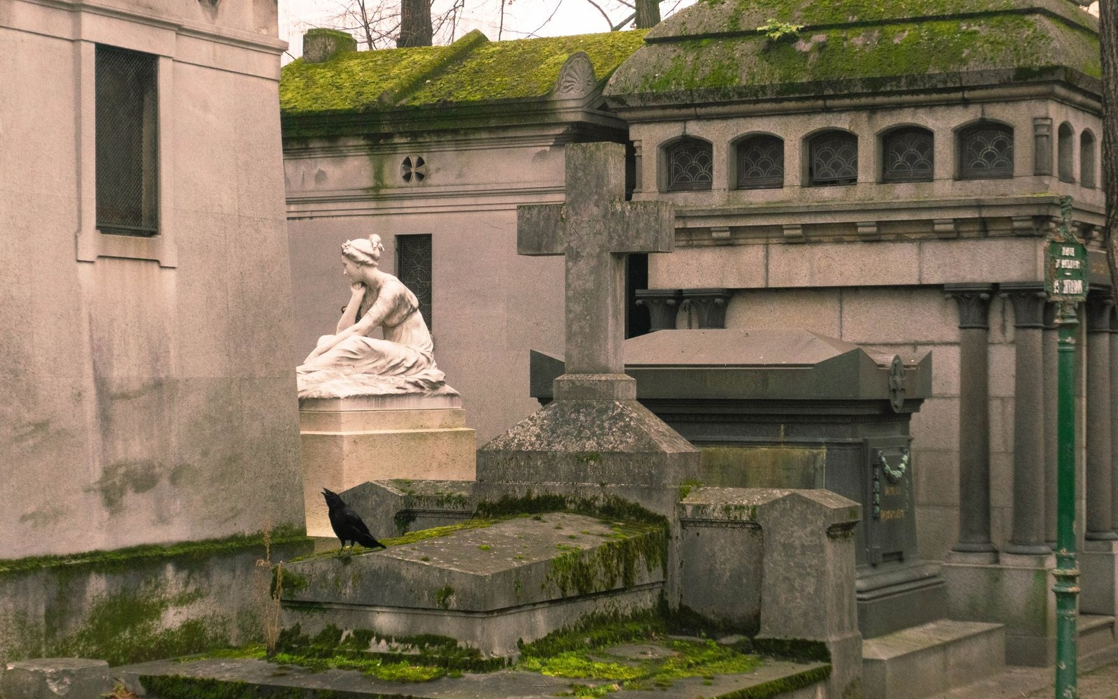 The Hahnemann monument at Père Lachaise cemetery, Paris, stone inscription readable, autumn light