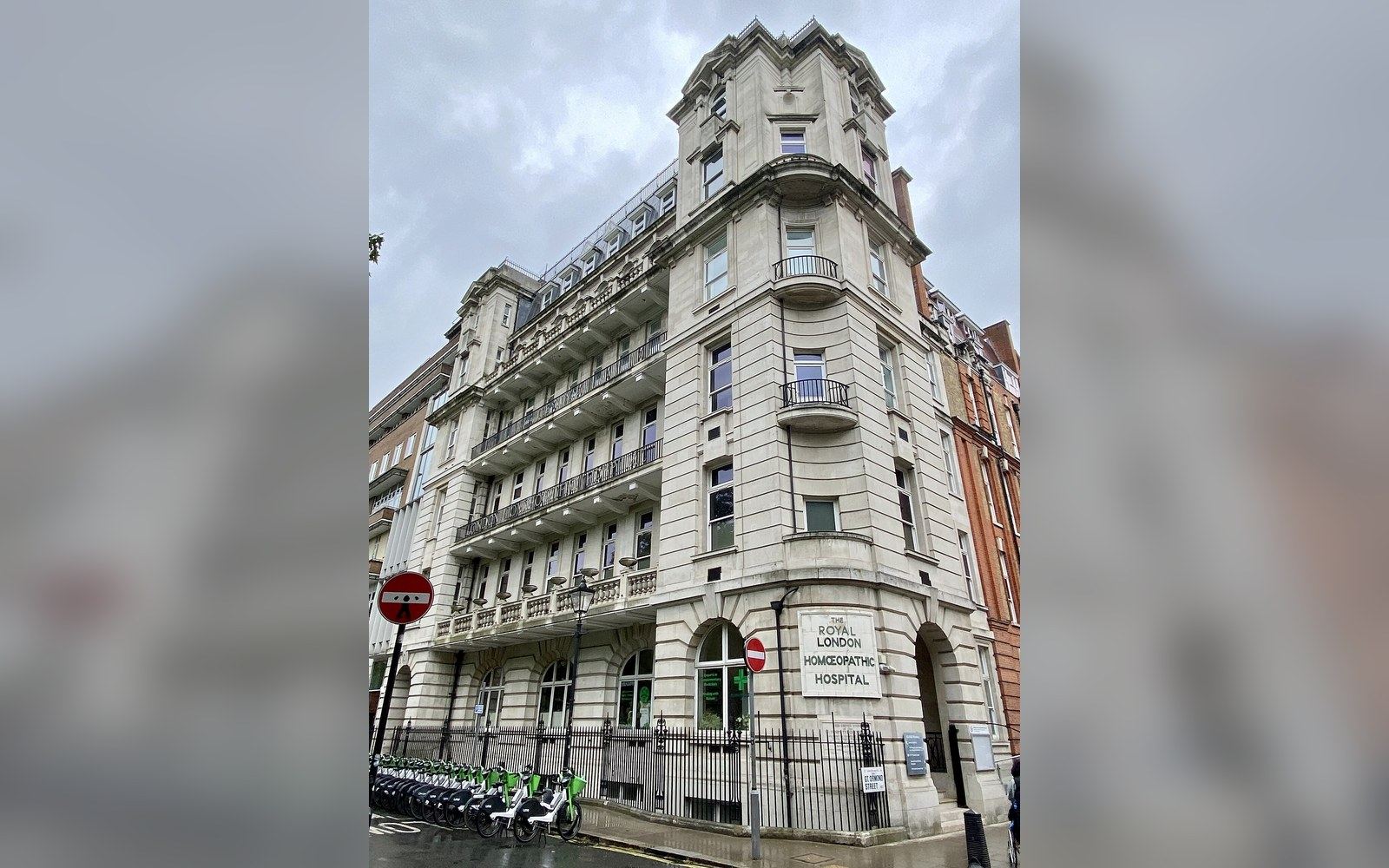 The facade of the Royal London Hospital for Integrated Medicine on Great Ormond Street, photographed straight on in overcast daylight